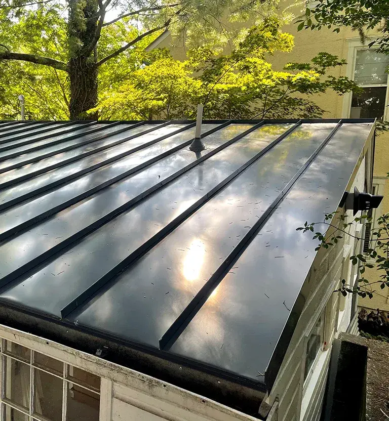 Metal standing seam accent roof installed in Maryland.