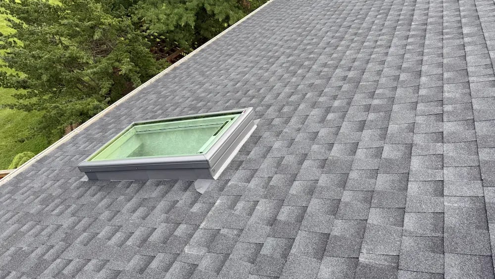 A New Architectural Roof with a Skylight That has blinds included in the Goshen Estates Neighborhood of Gaithersburg MD